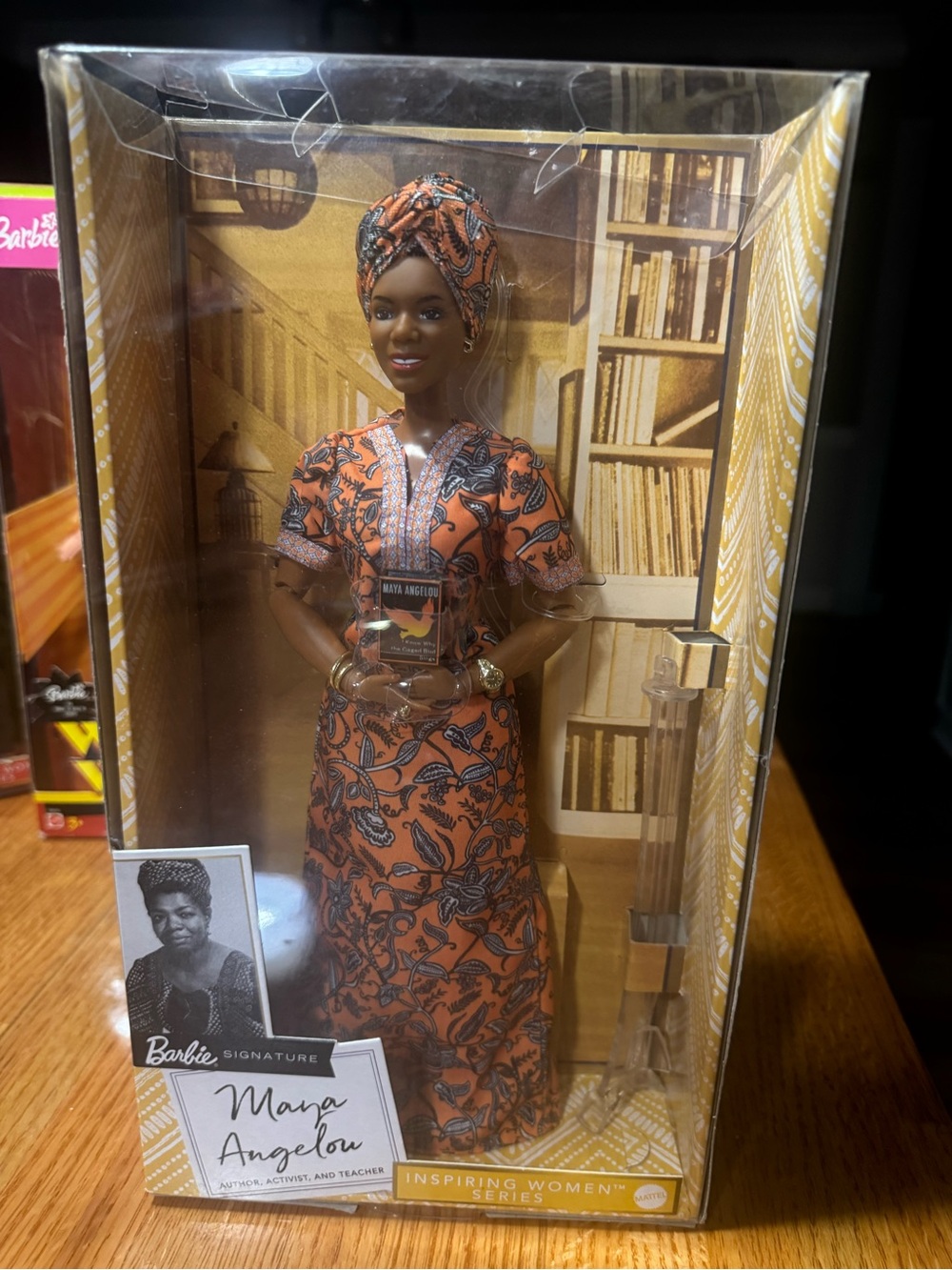 Mattel Barbie Signature Maya Angelou Doll in Orange and Black Patterned Outfit